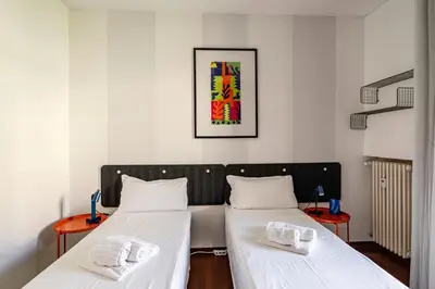 Letto o letti in una camera di GuestHost - Central apartment near Padua Cathedral