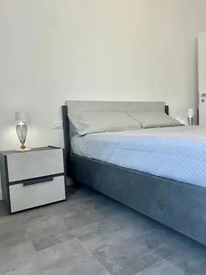 Letto o letti in una camera di De Mio's Apartment