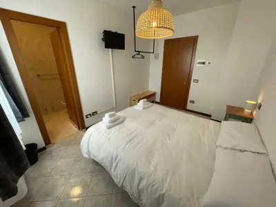 Letto o letti in una camera di Albergaria