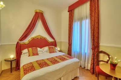 Letto o letti in una camera di Palazzo Malipiero Trevisan - Le Tre Dimore D'Epoca