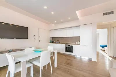Cucina o angolo cottura di Stylish Poolside Apartment, Jesolo-Venice