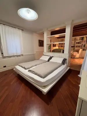 Letto o letti in una camera di La Pisana Relais di Campagna