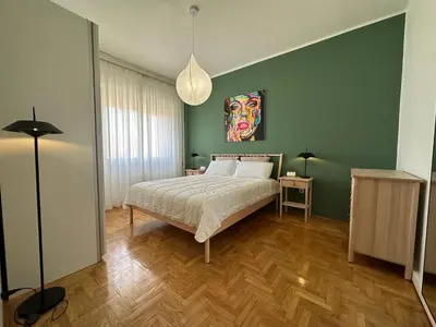 Letto o letti in una camera di NEW modern Flat in the Heart of Treviso