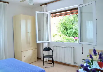 Letto o letti in una camera di Giardino al Mare