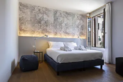 Letto o letti in una camera di Residence Foscarini