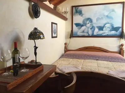 Letto o letti in una camera di B&B Tra Mare e Laguna