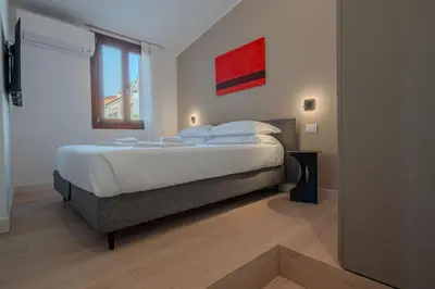 Letto o letti in una camera di Ca' Marcello Levante