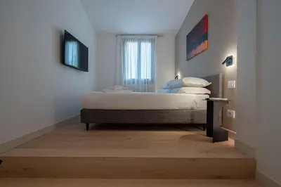 Letto o letti in una camera di Ca' Marcello Levante