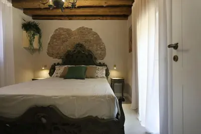 Letto o letti in una camera di Chioggia - Luxury Apartment San Nicolò 1