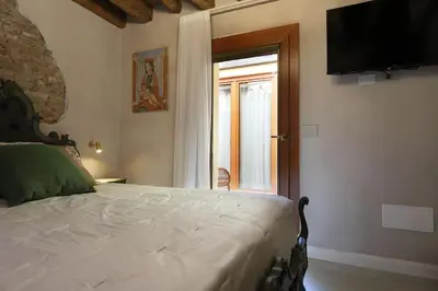 Letto o letti in una camera di Chioggia - Luxury Apartment San Nicolò 1