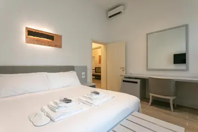 Letto o letti in una camera di Ca' Ramandolo Garden Apartment