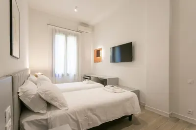 Letto o letti in una camera di Ca' Ramandolo Garden Apartment