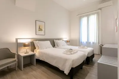 Letto o letti in una camera di Ca' Ramandolo Garden Apartment