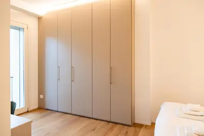 Letto o letti in una camera di Ca' Borsa IV - Suite con balcone in pieno centro