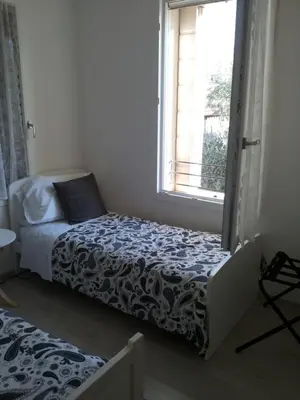 Letto o letti in una camera di Dafne B&B