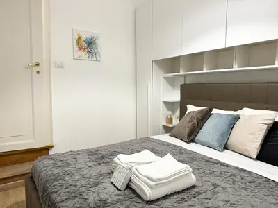 Letto o letti in una camera di La Meridiana - Grande e moderno con vista stupenda