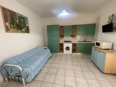 Cucina o angolo cottura di Spacious apartment just 200mt from the beach