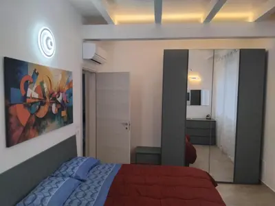 Letto o letti in una camera di La Tavernetta delle Terme Euganee da Mauro e Rosi