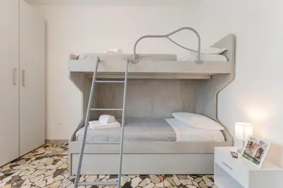 Letto o letti in una camera di Elisa Flat - 15 min from Venice & Wi-Fi