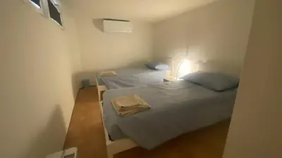 Letto o letti in una camera di Appartamento laguna