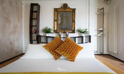 Letto o letti in una camera di Les Suites BOUTIQUE by Sleep in MURANO