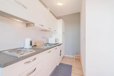 Cucina o angolo cottura di Cervino's Home - 20 min from Venice & Parking