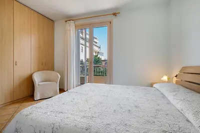 Letto o letti in una camera di Residence Valentina - Primo piano