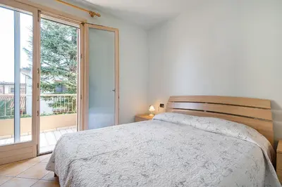 Letto o letti in una camera di Residence Valentina - Primo piano