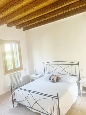 Letto o letti in una camera di Villa Riviera Naviglio Venezia
