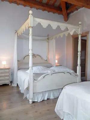 Letto o letti in una camera di Villa Riviera Naviglio Venezia