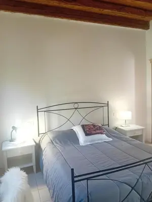 Letto o letti in una camera di Villa Riviera Naviglio Venezia