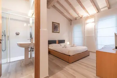 Letto o letti in una camera di Residenza Santa Chiara