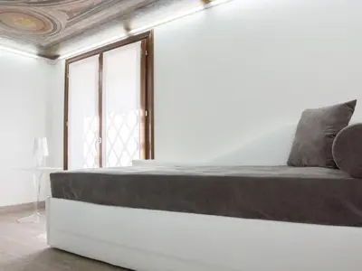 Letto o letti in una camera di Residence Le Bugne