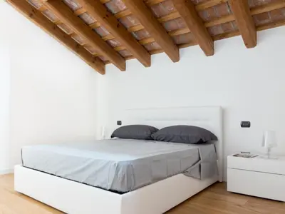Letto o letti in una camera di Residence Le Bugne