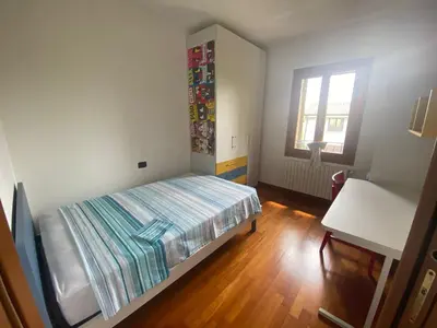Letto o letti in una camera di La casa di Daisy