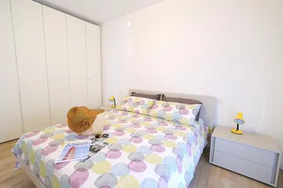 Letto o letti in una camera di Moderno trilocale con doppi servizi Piazza Marconi