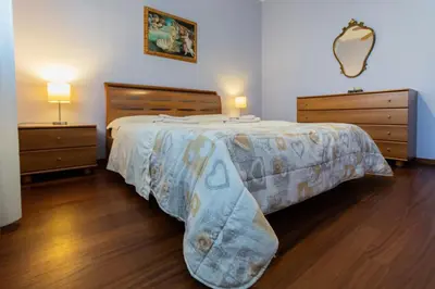 Letto o letti in una camera di Cà Milla