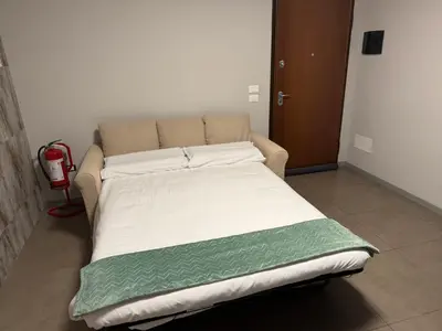 Letto o letti in una camera di Appartamento Vanessa - Venezia -Outlet