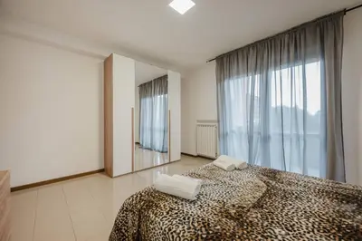 Letto o letti in una camera di Unico Apt 3A, 2 camere, parcheggio gratis, 10 minuti da Venezia