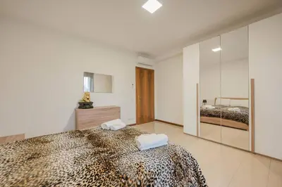 Letto o letti in una camera di Unico Apt 3A, 2 camere, parcheggio gratis, 10 minuti da Venezia
