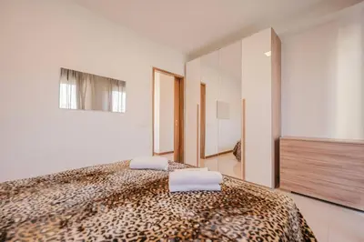 Letto o letti in una camera di Unico Apt 3B, 2 ospiti, Parcheggio gratis, 10 minuti da Venezia