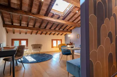 Area soggiorno di Palazzo delle Tre Lune Apartments