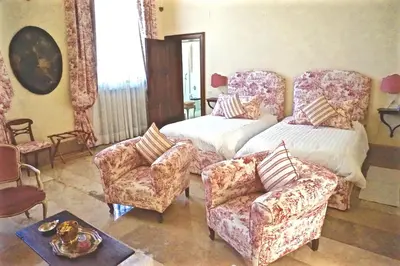 Letto o letti in una camera di Palazzo Mantua Benavides Suites & Apartments