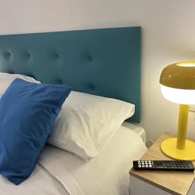 Letto o letti in una camera di Rigoletto Apartments by Fenix