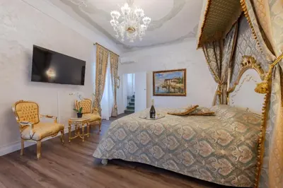 Letto o letti in una camera di Royal Widmann Home