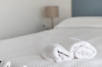 Letto o letti in una camera di Appartamento Adriatico Residence Pergoletta