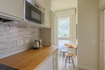 Cucina o angolo cottura di GuestHost - Cozy Apt near Basilica Sant'Antonio