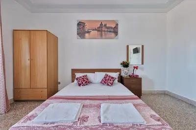 Letto o letti in una camera di Venice Mahdi Train station Appartement