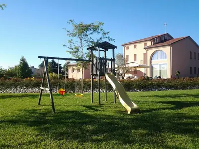 Area giochi per bambini di Agrialloggi La Palazzina