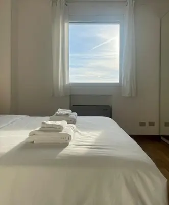 Letto o letti in una camera di 999-Ting
